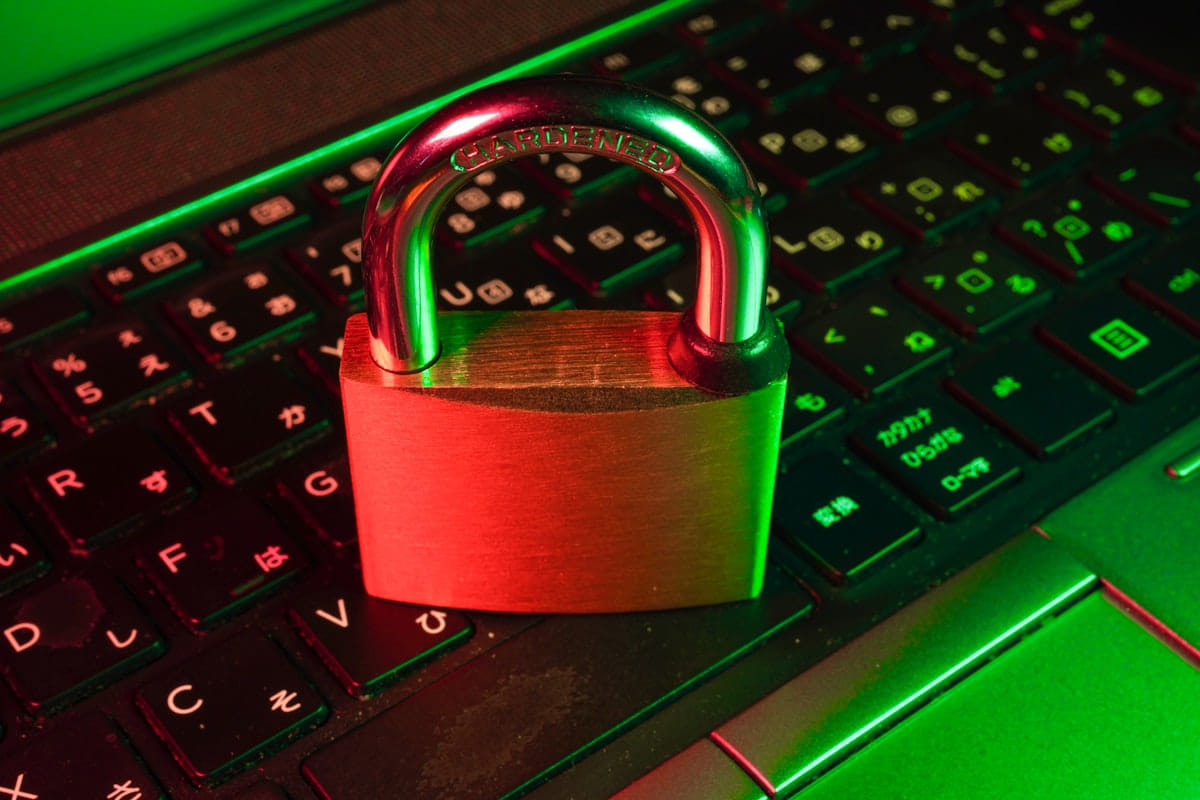A digital padlock icon over a circuit board, representing identity and access control infrastructure
